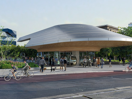 Visualisierung der geplanten Seilbahnstation am Kurt-Schumacher-Platz mit Gondeln, wartenden Fahrgästen sowie Radverkehr auf der angrenzenden Straße.